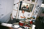 Jeff on drums with Will in the mixing booth